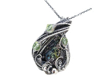 Load image into Gallery viewer, Bismuth Crystal Pendant with UV-Reactive Glass, Sterling Silver Wire Wrap