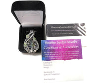 Load image into Gallery viewer, Bismuth Crystal Pendant with UV-Reactive Glass, Sterling Silver Wire Wrap