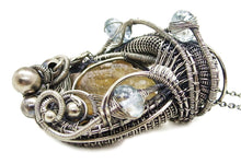 Load image into Gallery viewer, Calcite Wire-Wrapped Pendant in Sterling Silver with Blue Topaz