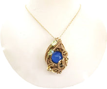 Load image into Gallery viewer, Color-Changing "Mood" Steampunk Pendant in Brass with UV-Reactive Glass