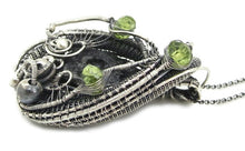 Load image into Gallery viewer, Black Tektite Pendant with Peridot, Sterling Silver Wire Wrap