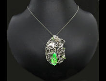 Load image into Gallery viewer, Uranium Glass Pendant with Upcycled Electronic and Watch Parts, Steampunk/Cyberpunk Fusion UV LED