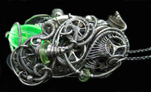 Load image into Gallery viewer, Uranium Glass Pendant with Upcycled Electronic and Watch Parts, Steampunk/Cyberpunk Fusion UV LED