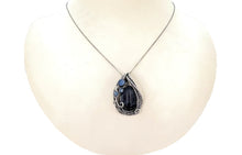 Load image into Gallery viewer, Trilobite Fossil Pendant: Blue Kyanite and Sterling Silver Wire Wrap