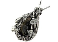 Load image into Gallery viewer, UV-Fluorescent, Black Rose Fluorite Pendant with Herkimer Diamonds: Sterling silver wire wrap