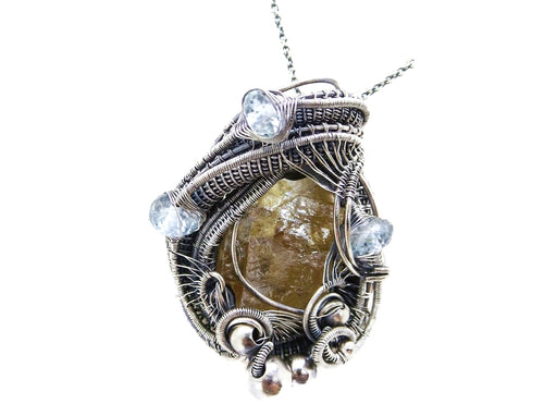 Calcite Wire-Wrapped Pendant in Sterling Silver with Blue Topaz