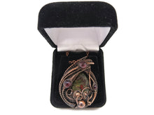 Load image into Gallery viewer, Dragon Blood Jasper Wire Wrapped Pendant in Bronze with Garnet