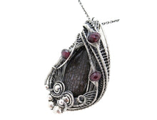 Load image into Gallery viewer, Agatized Dinosaur Bone and Rhodolite Garnet Wire-Wrapped Pendant in Sterling Silver