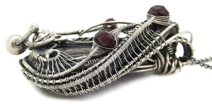 Agatized Dinosaur Bone and Rhodolite Garnet Wire-Wrapped Pendant in Sterling Silver