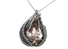 Load image into Gallery viewer, UV-Fluorescent Franklinite and Willemite Pendant: Sterling Silver Wire-Wrap with Pink Sapphire
