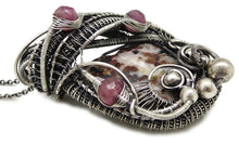 Load image into Gallery viewer, UV-Fluorescent Franklinite and Willemite Pendant: Sterling Silver Wire-Wrap with Pink Sapphire