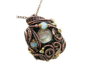 Liquid Steampunk Glow-In-The-Dark Pendant: Bronze Wire-Wrapped Necklace with UV-Fluorescent Glass
