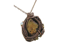 Load image into Gallery viewer, Liquid Steampunk Glow-In-The-Dark Pendant: Bronze Wire-Wrapped Necklace with UV-Fluorescent Glass