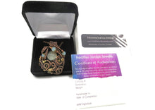 Load image into Gallery viewer, Liquid Steampunk Glow-In-The-Dark Pendant: Bronze Wire-Wrapped Necklace with UV-Fluorescent Glass