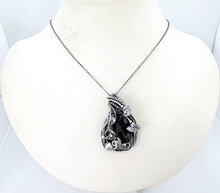 Load image into Gallery viewer, UV-Fluorescent, Black Rose Fluorite Pendant with Herkimer Diamonds: Sterling silver wire wrap
