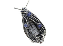 Load image into Gallery viewer, Orthoceras Fossil Pendant with Tanzanite in Sterling Silver, Wire Wrap