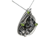 Load image into Gallery viewer, Admire Stony Iron Pallasite Meteorite Pendant, Wire-Wrapped in Sterling Silver with Peridot