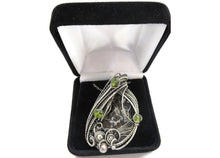 Load image into Gallery viewer, Admire Stony Iron Pallasite Meteorite Pendant, Wire-Wrapped in Sterling Silver with Peridot