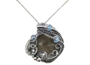 Petoskey Stone Pendant Necklace in Sterling Silver, Wire Wrapped with Blue Topaz