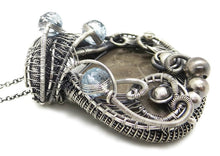 Load image into Gallery viewer, Petoskey Stone Pendant Necklace in Sterling Silver, Wire Wrapped with Blue Topaz