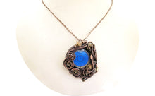 Load image into Gallery viewer, Blue Disc Spirit Level Steampunk Pendant, Wire-Wrapped in Bronze, Copper, and Brass