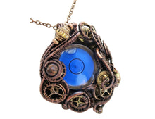 Load image into Gallery viewer, Blue Disc Spirit Level Steampunk Pendant, Wire-Wrapped in Bronze, Copper, and Brass