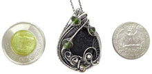 Load image into Gallery viewer, Black Tektite Pendant with Peridot, Sterling Silver Wire Wrap