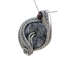Larvikite Wire-Wrapped Pendant in Sterling Silver with Garnet; "Woven Donut"