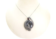 Load image into Gallery viewer, Larvikite Wire-Wrapped Pendant in Sterling Silver with Garnet; &quot;Woven Donut&quot;