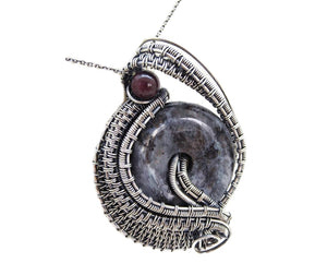 Larvikite Wire-Wrapped Pendant in Sterling Silver with Garnet; "Woven Donut"