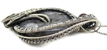 Load image into Gallery viewer, Larvikite Wire-Wrapped Pendant in Sterling Silver with Garnet; &quot;Woven Donut&quot;